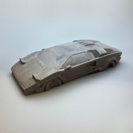 N°010 — TRADER